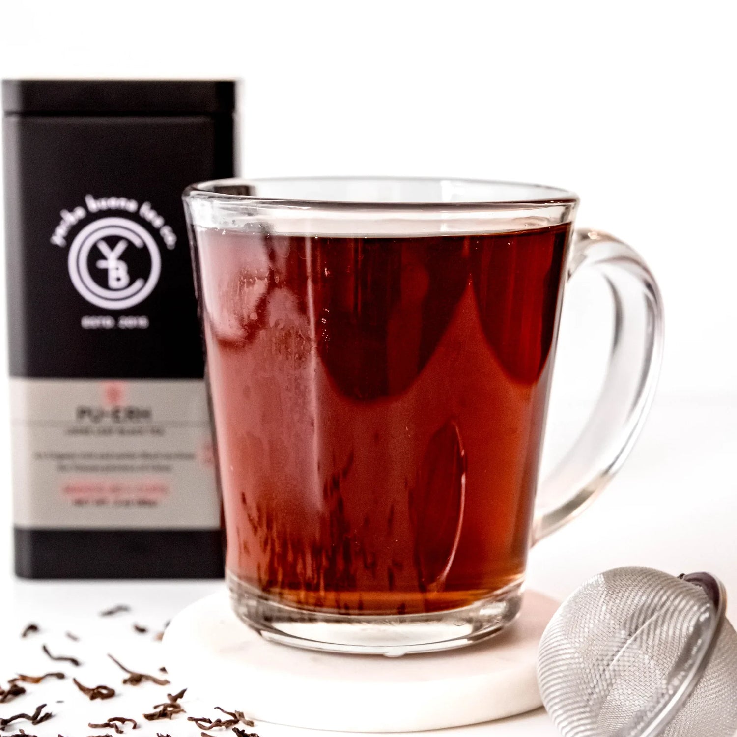 Brewed cup of organic Pu-erh tea by Yerba Buena Tea Co.