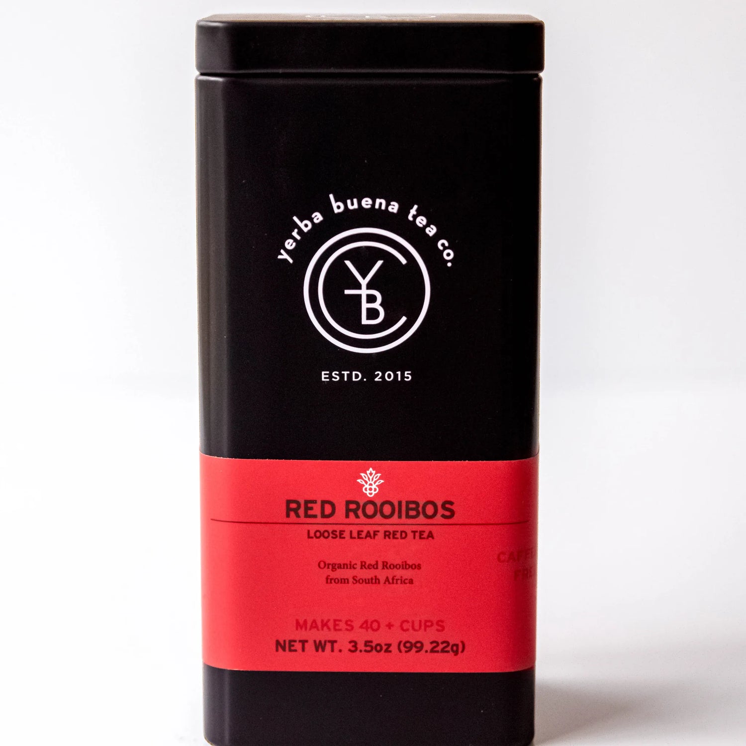 Black metal canister with red label displaying Red Rooibos loose leaf red tea, by Yerba Buena Tea Company.